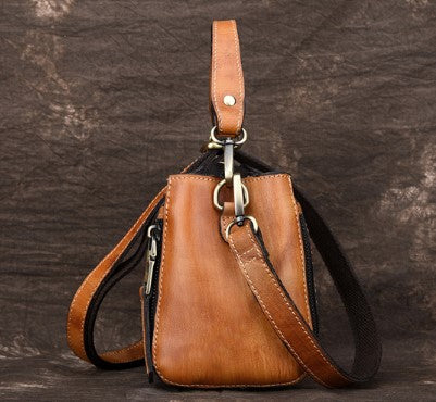 Vintage hand embossed handbag with shoulder inclined water bucket