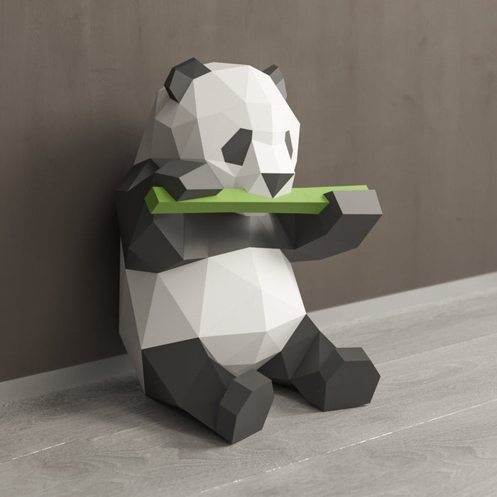 Panda model eating bamboo